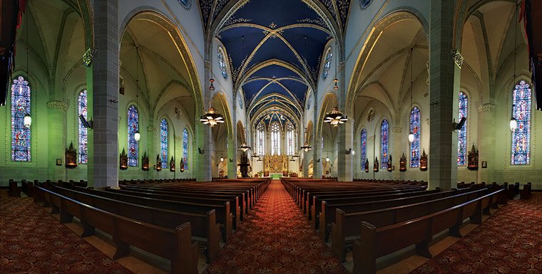 St. Florian Roman Catholic Church: Panoramic view of the nave with blue rib vault and stained glass
