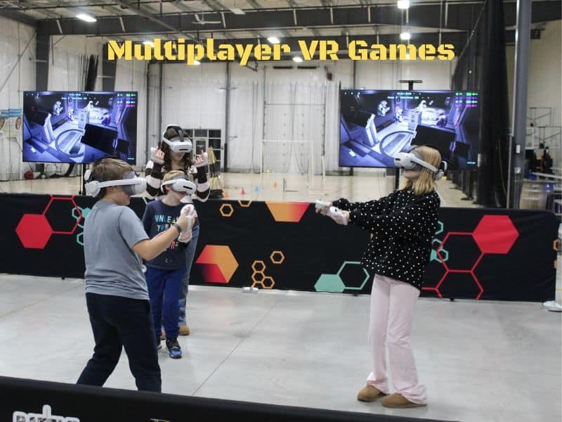 Kids in VR headsets play in the arena hall with game screens in the background