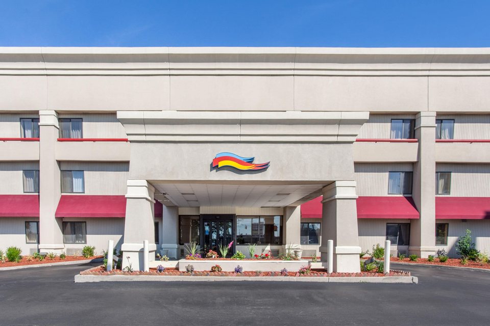 The hotel entrance with red awnings