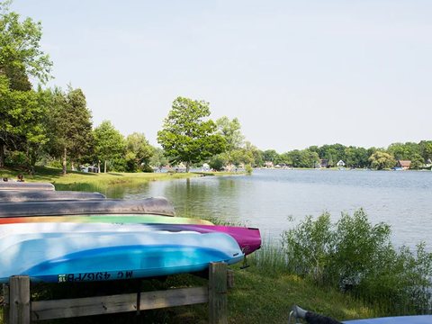 Colorful kayaks on the lakeshore