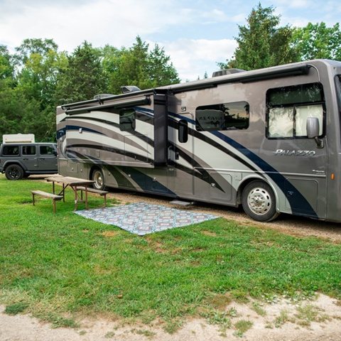 A motorhome on a grassy campsite