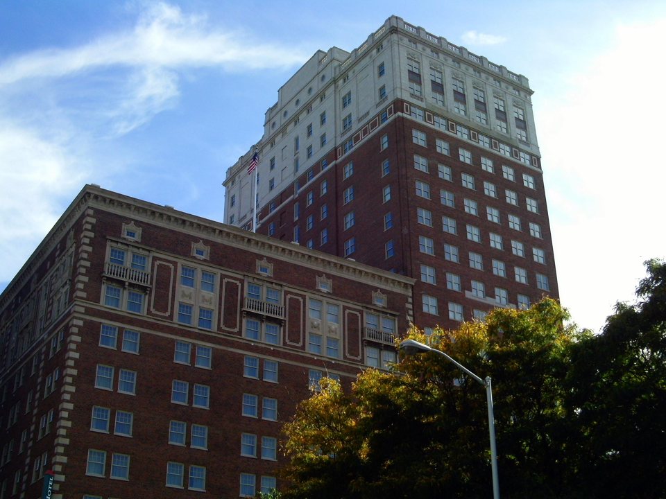 The restored Fort Shelby hotel's brick facade downtown