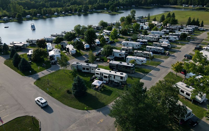 Aerial view of the campground's RV sites beside the water