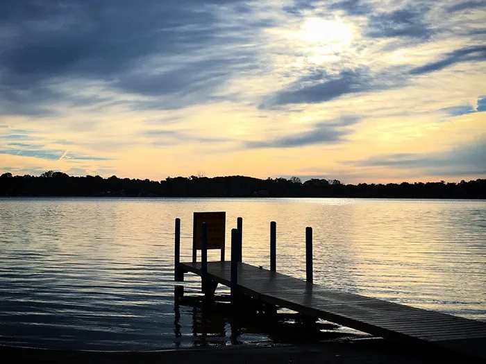 A dock on the lake at dusk