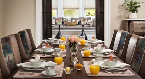 A set breakfast table in the dining room