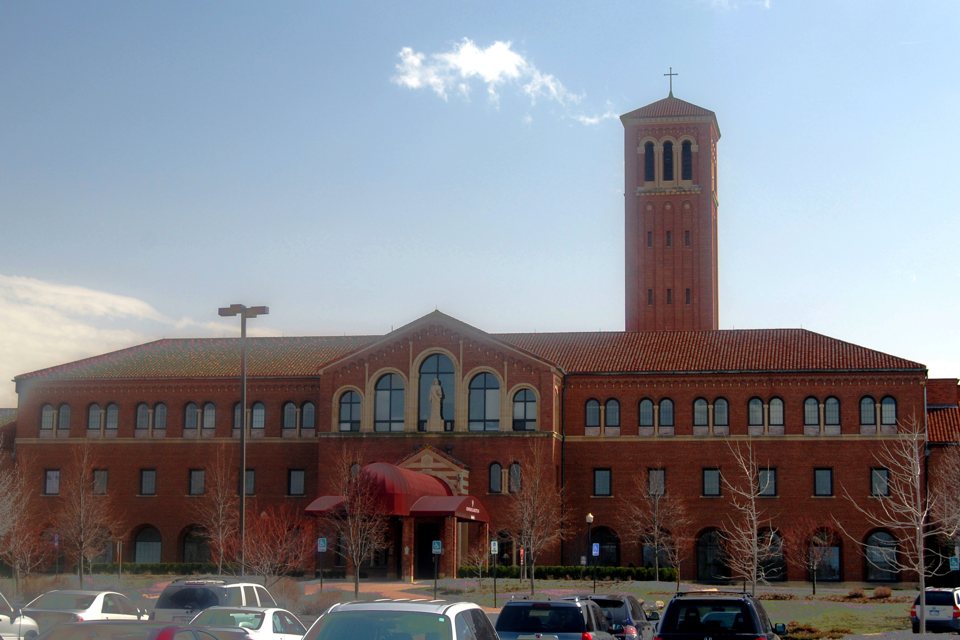 The former St. John's seminary brick building with its bell tower in Plymouth, 2008