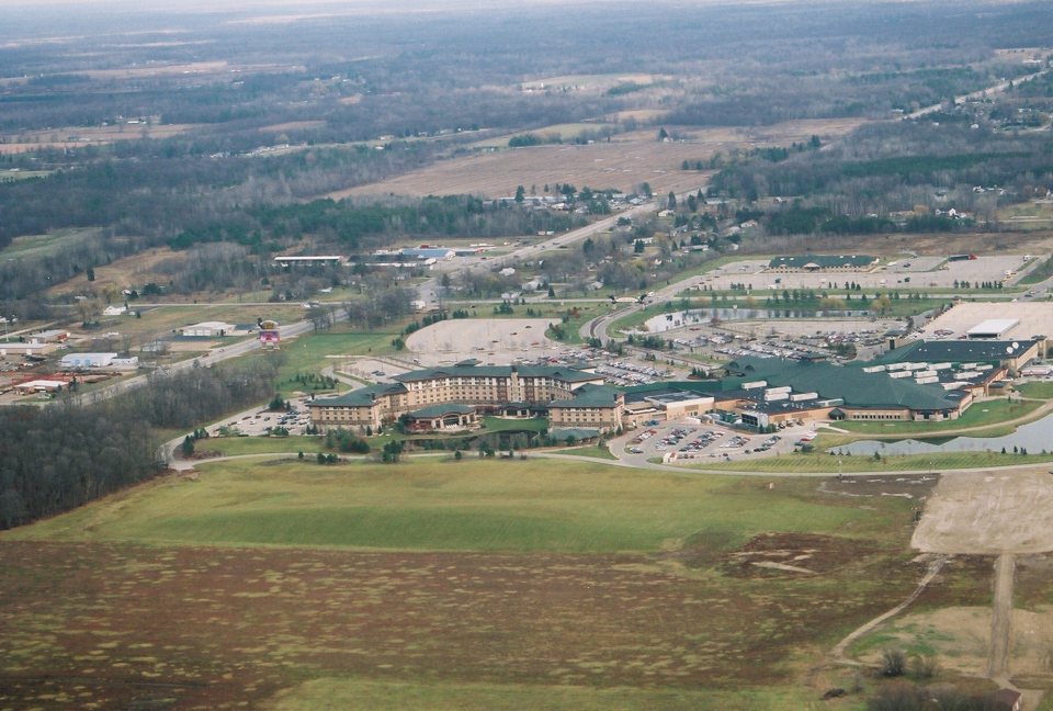 Aerial view of the hotel and casino complex with its parking lots