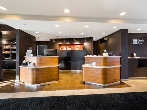 The lobby with two wood-panelled front desk counters
