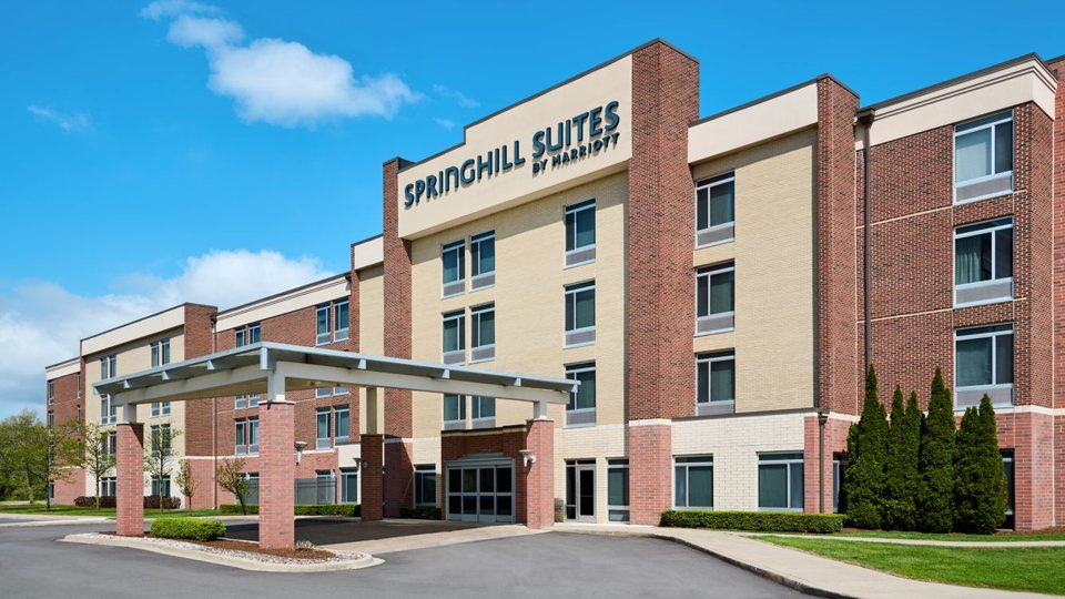 The multi-storey hotel facade with the SpringHill Suites sign