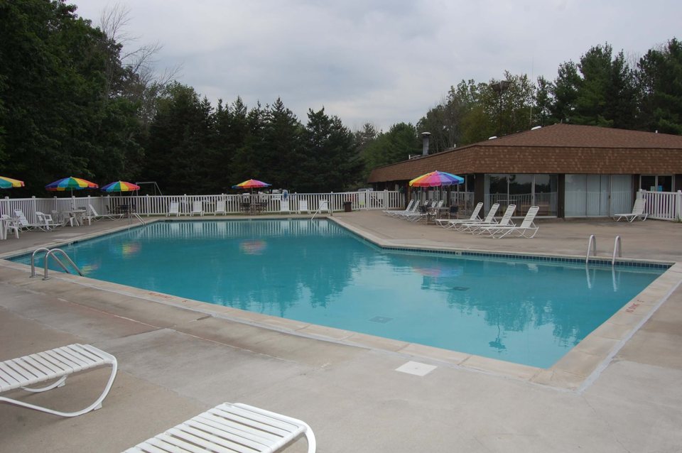 The campground pool with lounge chairs
