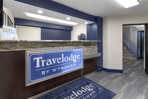 The front desk with a Travelodge mat