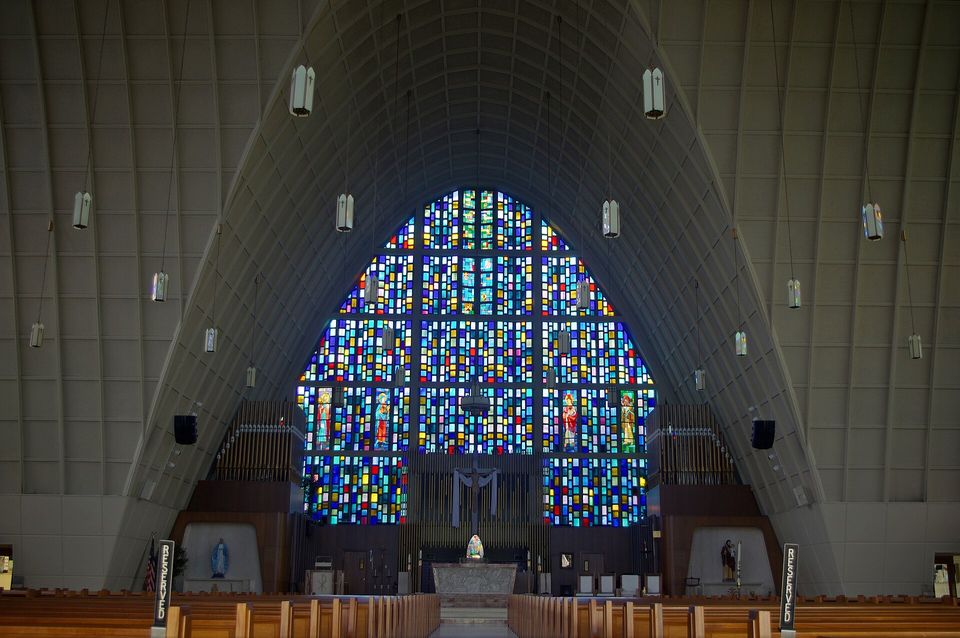 Inside St. Clement, with its walls of stained glass