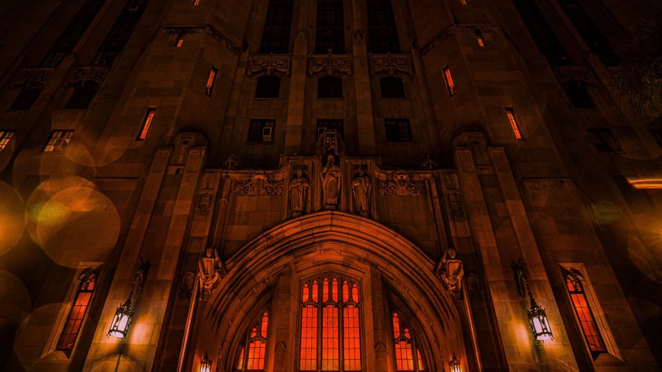 Detroit's Masonic Temple building glowing in red light at night